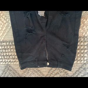 Black distressed skinny jeans